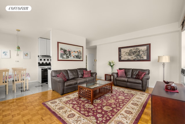 living room with light parquet floors