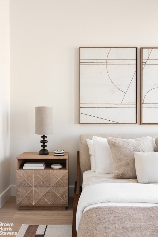 bedroom featuring wood-type flooring