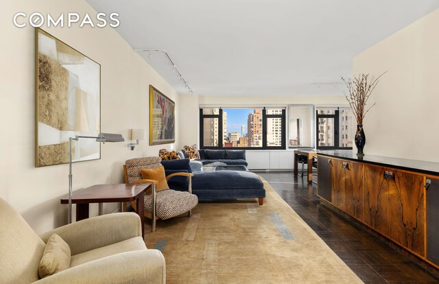 sitting room featuring track lighting