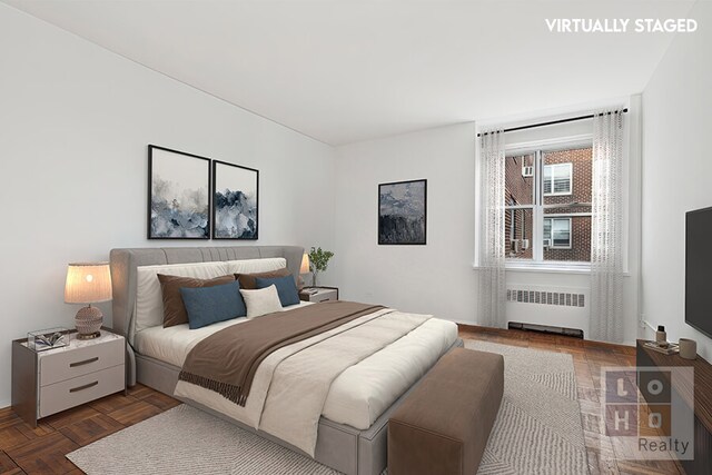 577 Grand St Unit F1904, New York City, NY 10002 - bedroom featuring radiator heating unit