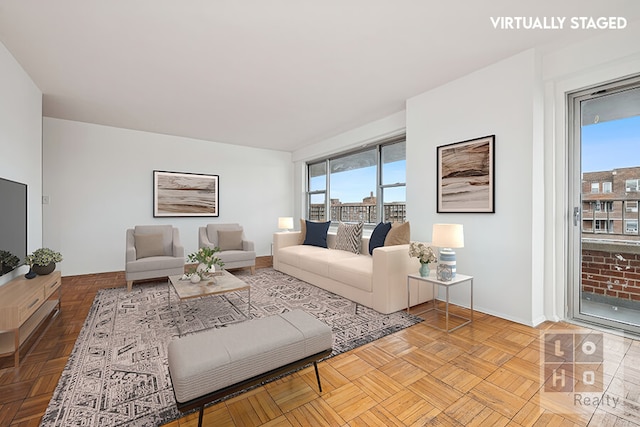 577 Grand St Unit F1904, New York City, NY 10002 - living room with baseboards