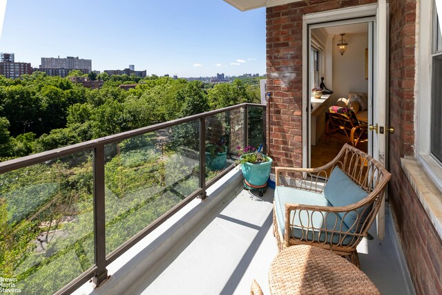 balcony featuring a view of city