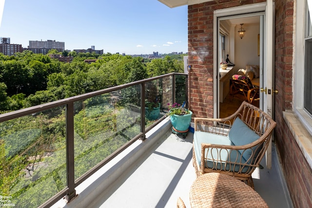 balcony featuring a view of city