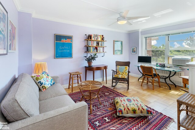 living area featuring crown molding, cooling unit, a ceiling fan, and baseboards