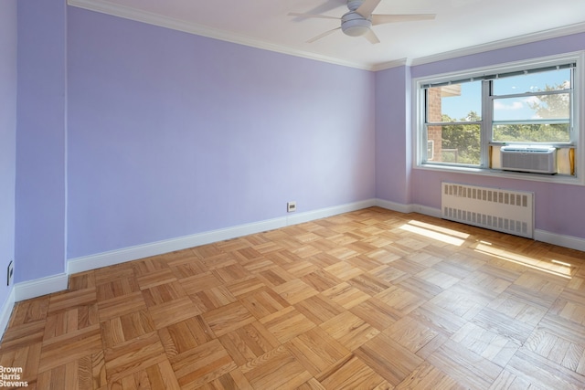 spare room featuring crown molding, baseboards, radiator heating unit, cooling unit, and a ceiling fan