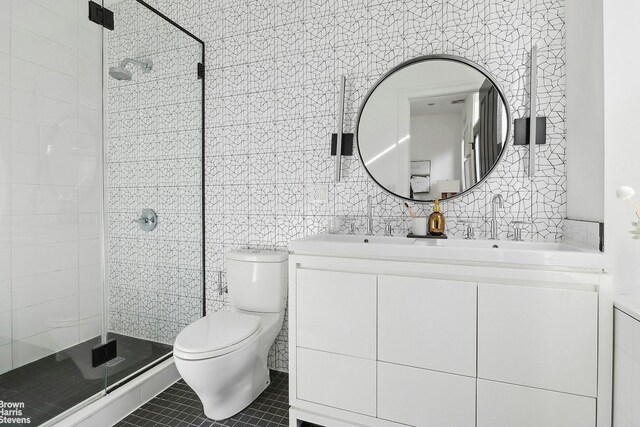 170 S 4th St, New York City, NY 11211 - full bath featuring a shower stall, toilet, vanity, and tile walls