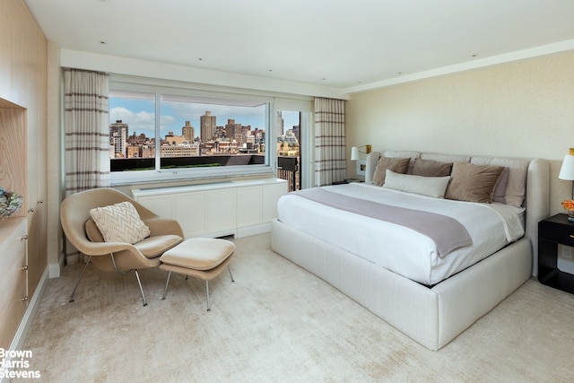 bedroom featuring a city view