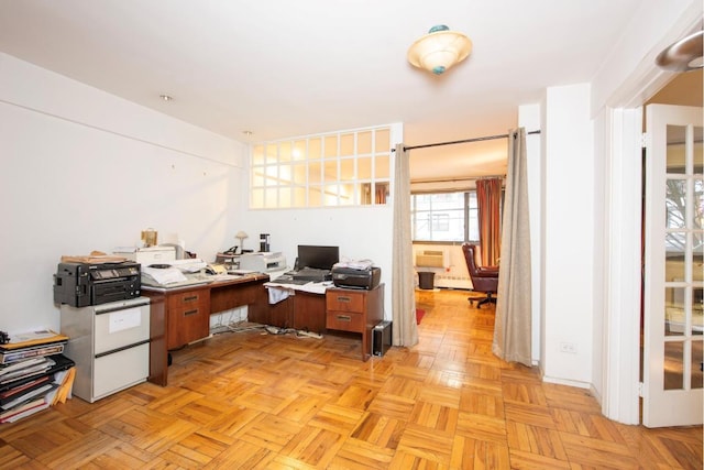 home office with light parquet floors