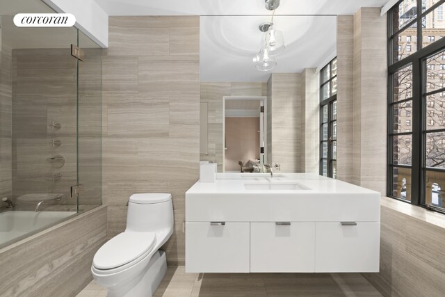 kitchen featuring white cabinetry, sink, and dark tile patterned flooring