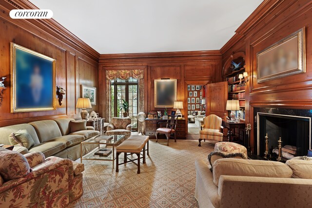 living room featuring ornamental molding and hardwood / wood-style floors