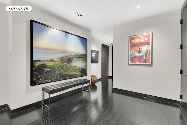 interior space with recessed lighting, wood finished floors, visible vents, and baseboards