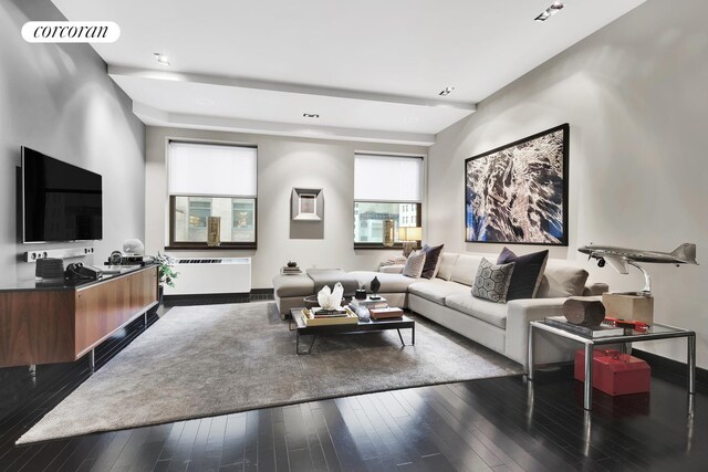 living room featuring dark hardwood / wood-style flooring