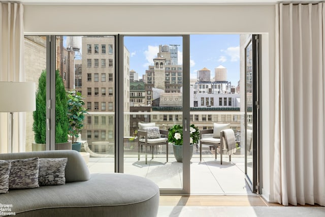 doorway to outside featuring a view of city
