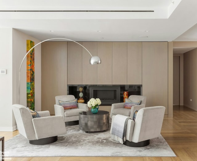 living room featuring light parquet flooring