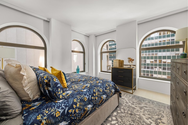 bedroom with wood finished floors