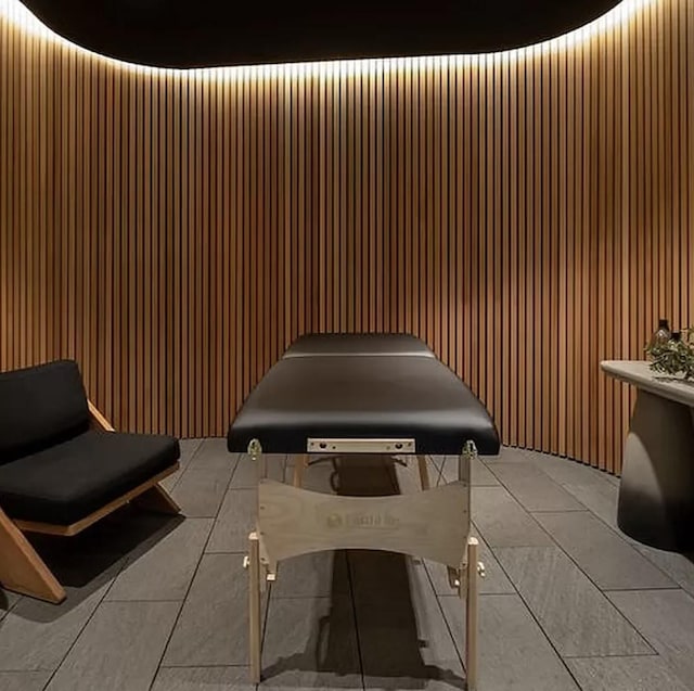 interior space featuring wood walls