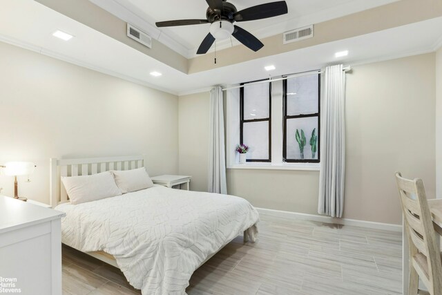 bedroom featuring ceiling fan and ornamental molding