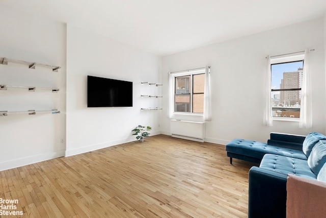 unfurnished living room featuring light hardwood / wood-style flooring