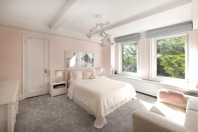 bedroom featuring an inviting chandelier, beamed ceiling, and carpet