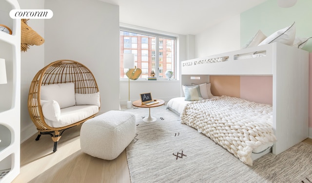 bedroom with wood finished floors