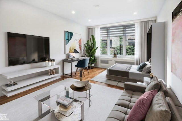 311 E 75th St Unit 3H, New York City, NY 10021 - living area with wood finished floors, recessed lighting, and a desk