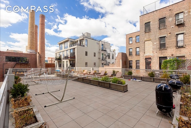 surrounding community with a patio area and fence