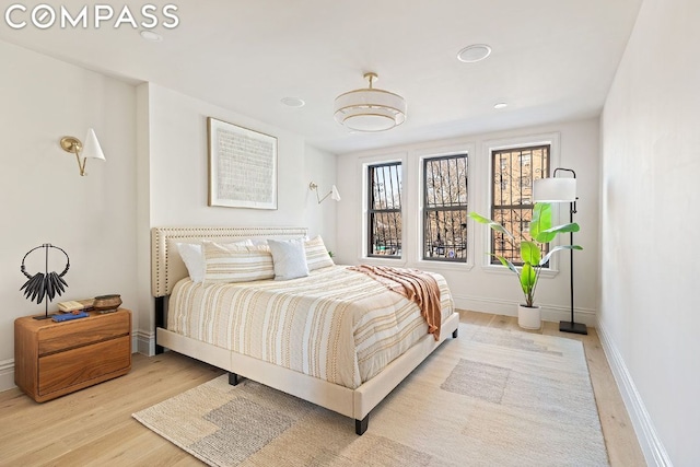 bedroom featuring light wood-type flooring