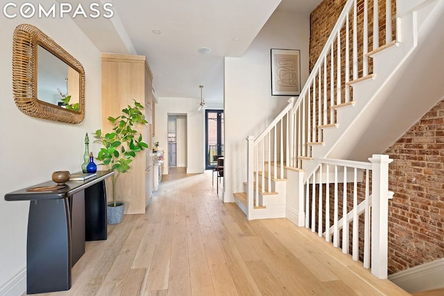 corridor featuring light hardwood / wood-style flooring