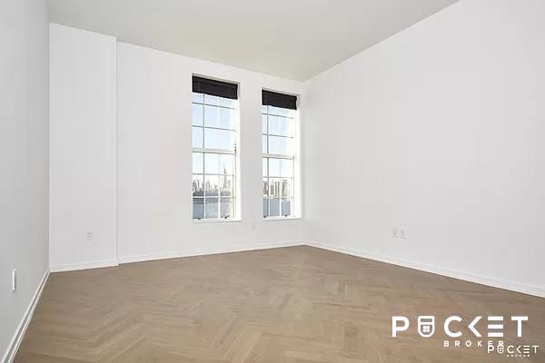 spare room with parquet floors