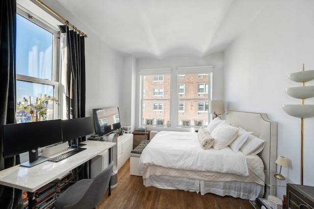 bedroom featuring dark hardwood / wood-style floors