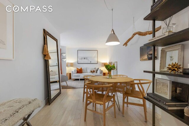 dining room with light wood-type flooring