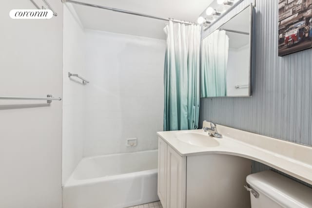 full bath featuring vanity, toilet, and shower / tub combo with curtain