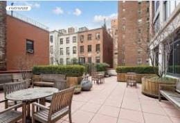 exterior space featuring a patio and outdoor dining area