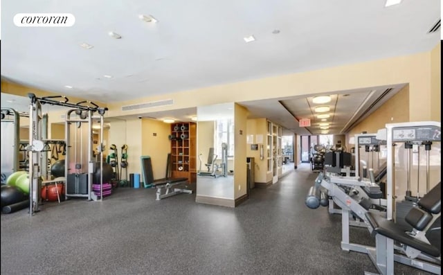 exercise room featuring visible vents