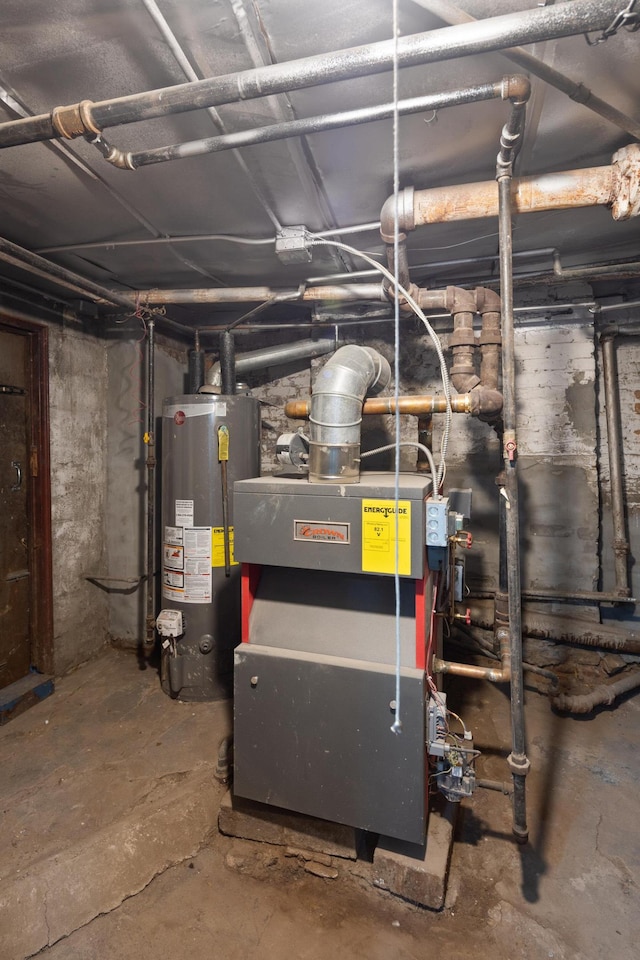 utility room featuring gas water heater