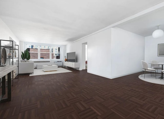 living room featuring radiator heating unit