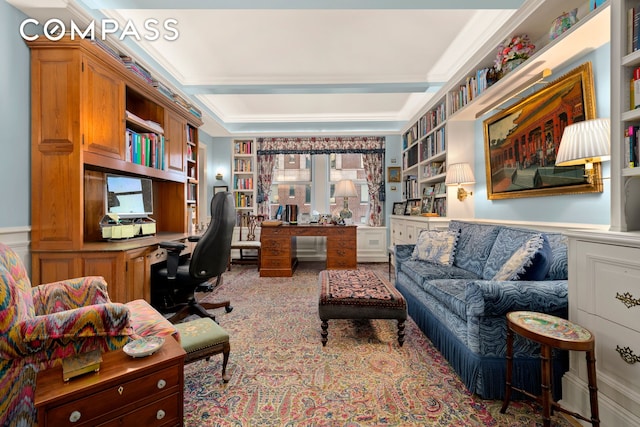 office with built in study area, carpet floors, crown molding, and built in features