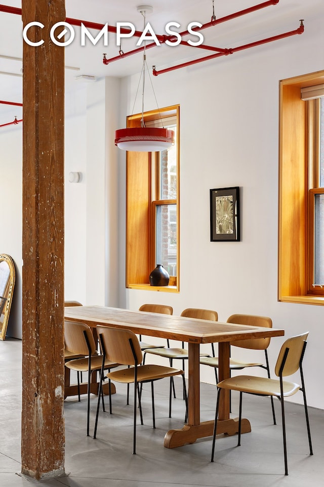 dining area with a wealth of natural light