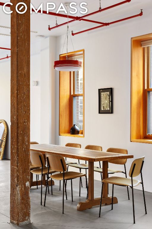 dining area with concrete floors