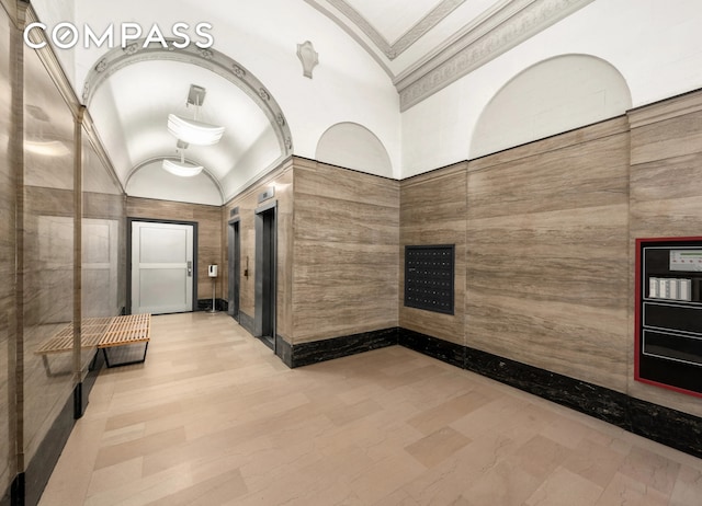 241 W 36th St Unit 7R, New York City, NY 10018 - common area with vaulted ceiling and tile walls