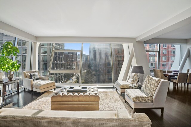 515 W 23rd St Unit 6Flr, New York City, NY 10011 - living area featuring a city view and wood finished floors