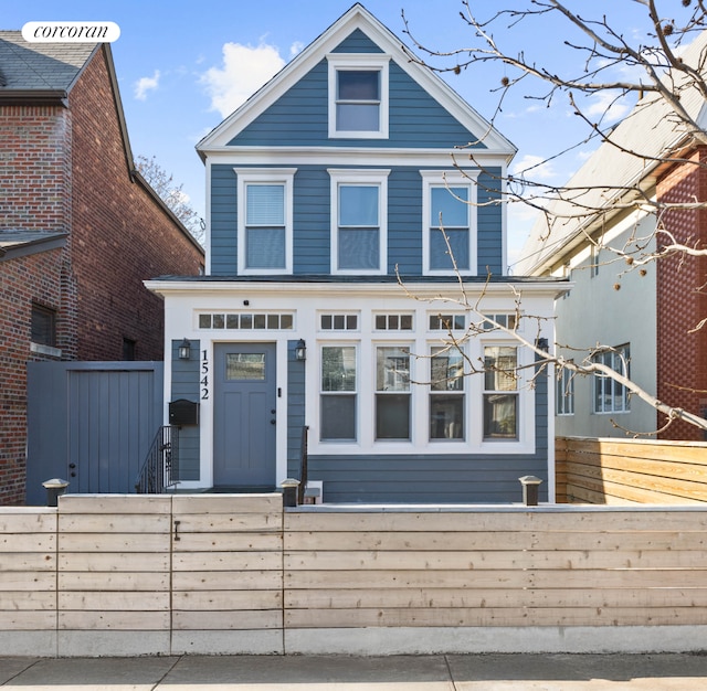 view of front of property with a fenced front yard