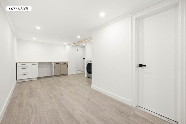 interior space featuring baseboards, visible vents, recessed lighting, crown molding, and washer / dryer