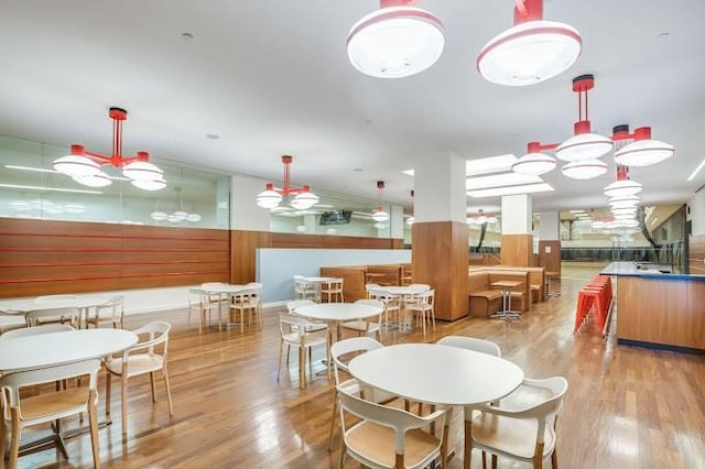 dining space featuring wood finished floors