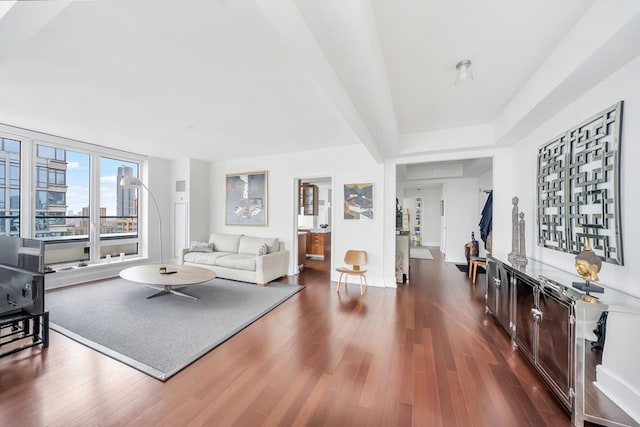 living area with dark wood finished floors and baseboards