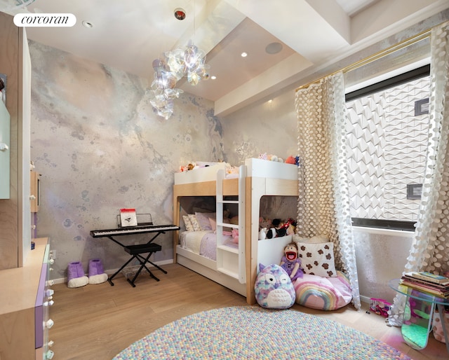 bedroom featuring wood finished floors