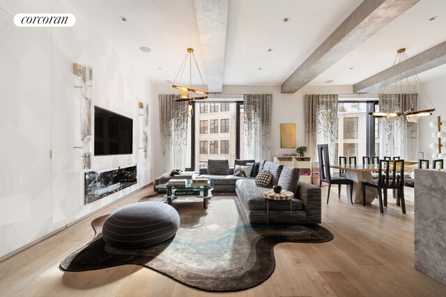 living room featuring an inviting chandelier