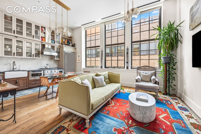 living room with light wood-style floors and baseboards