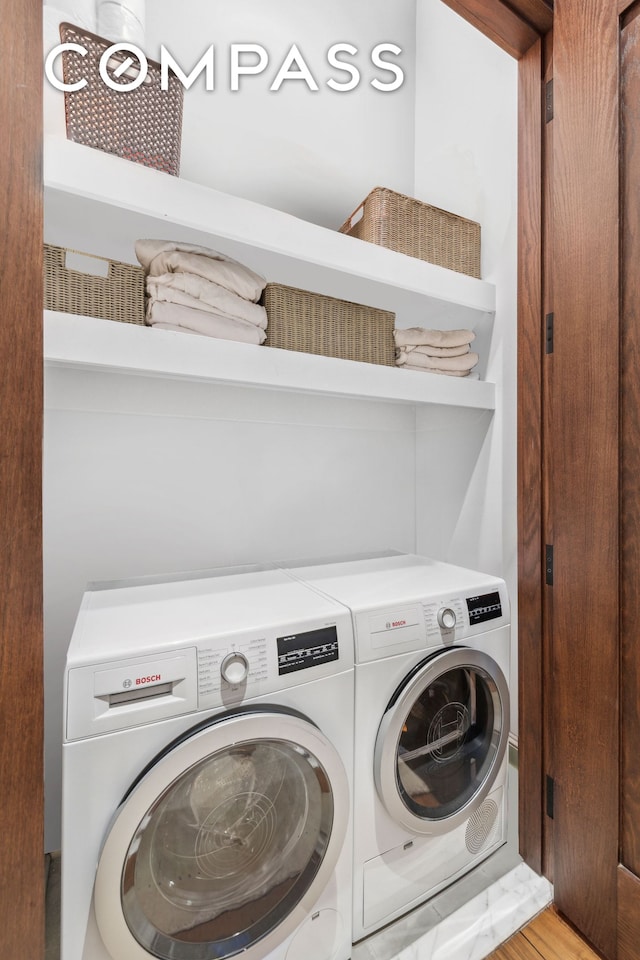 laundry area featuring washer and dryer and laundry area