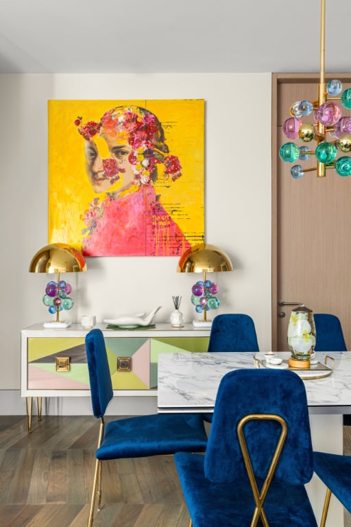 dining area featuring dark parquet flooring